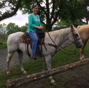 Photo of Spencer Dougherty on horseback